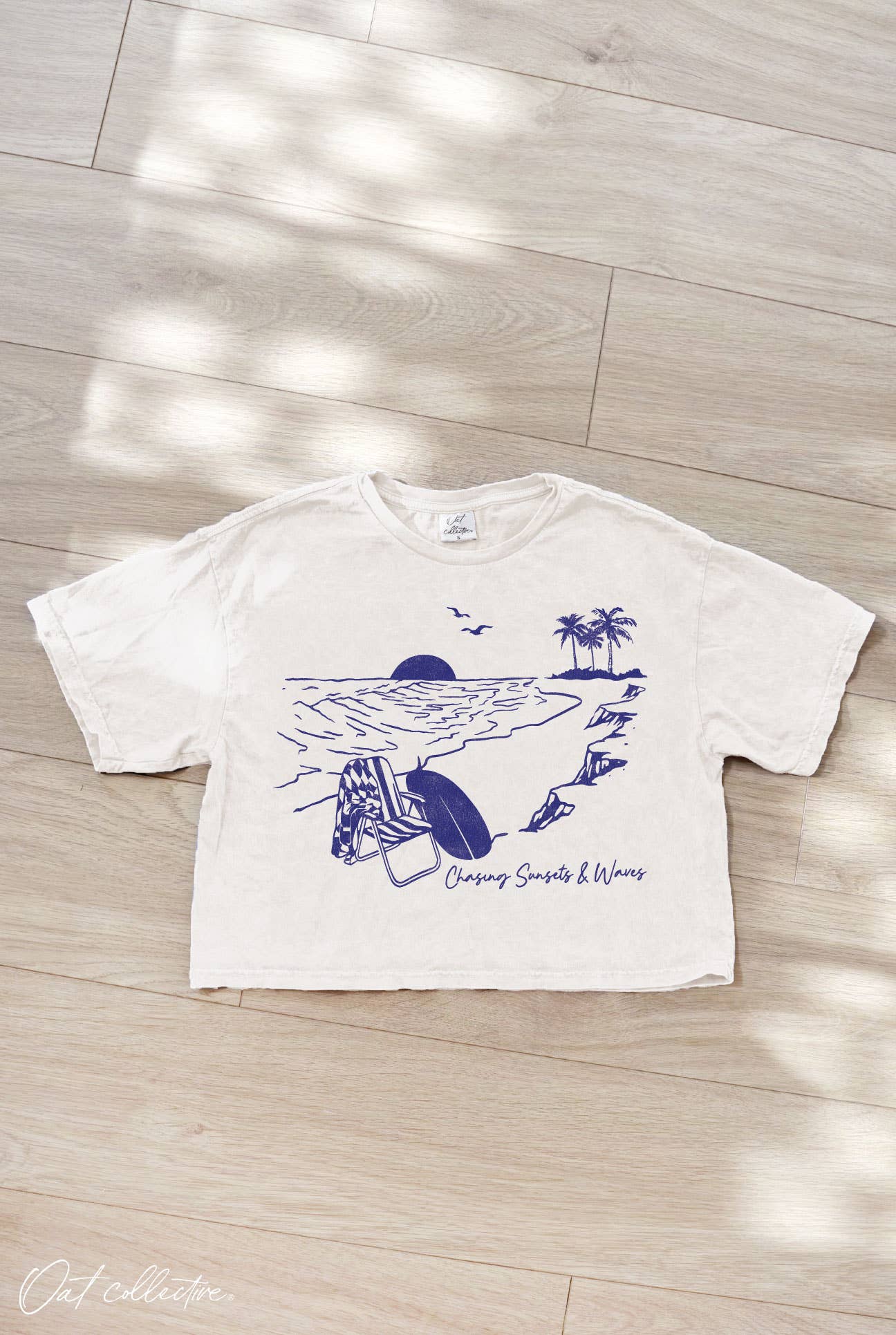Chasing Sunsets and Waves Cropped Mineral Graphic Top