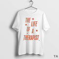 Top The Life Of A Therapist Showgirl T Shirt Sweater