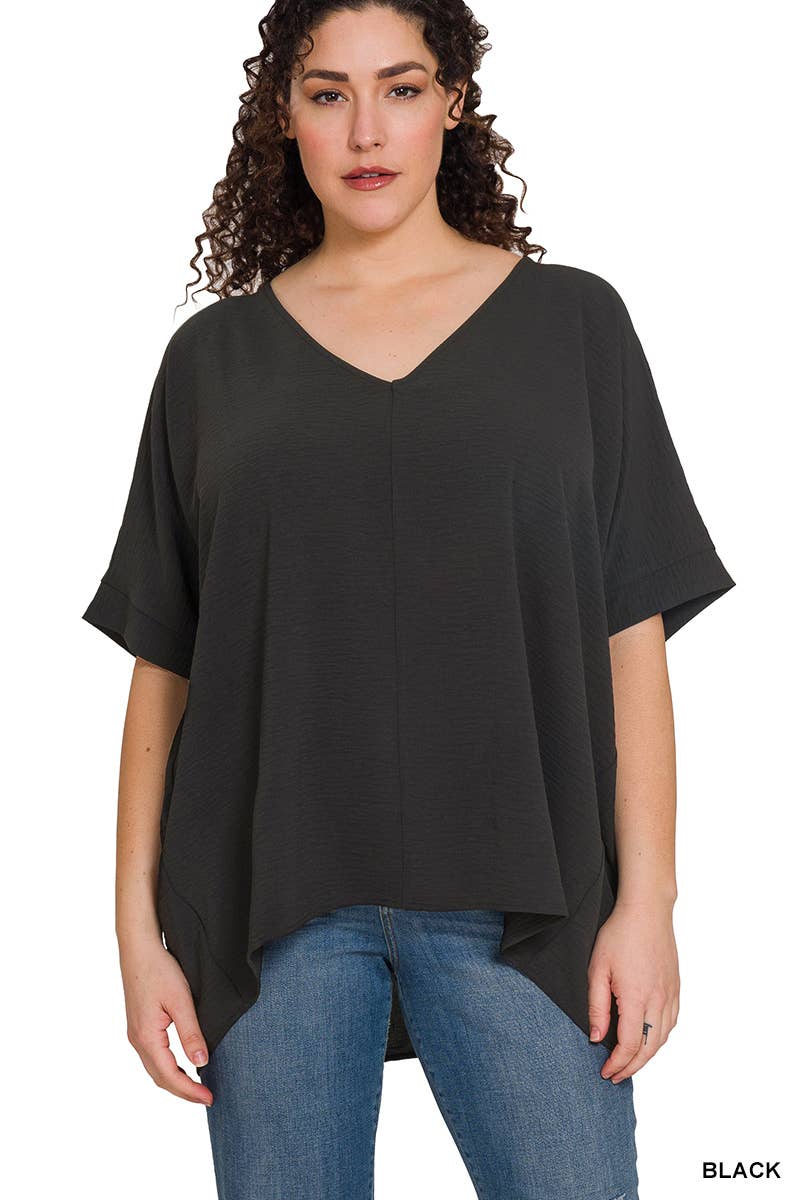 ..._ Plus Size Woven Airflow V-Neck Dolman Short Sleeve Top